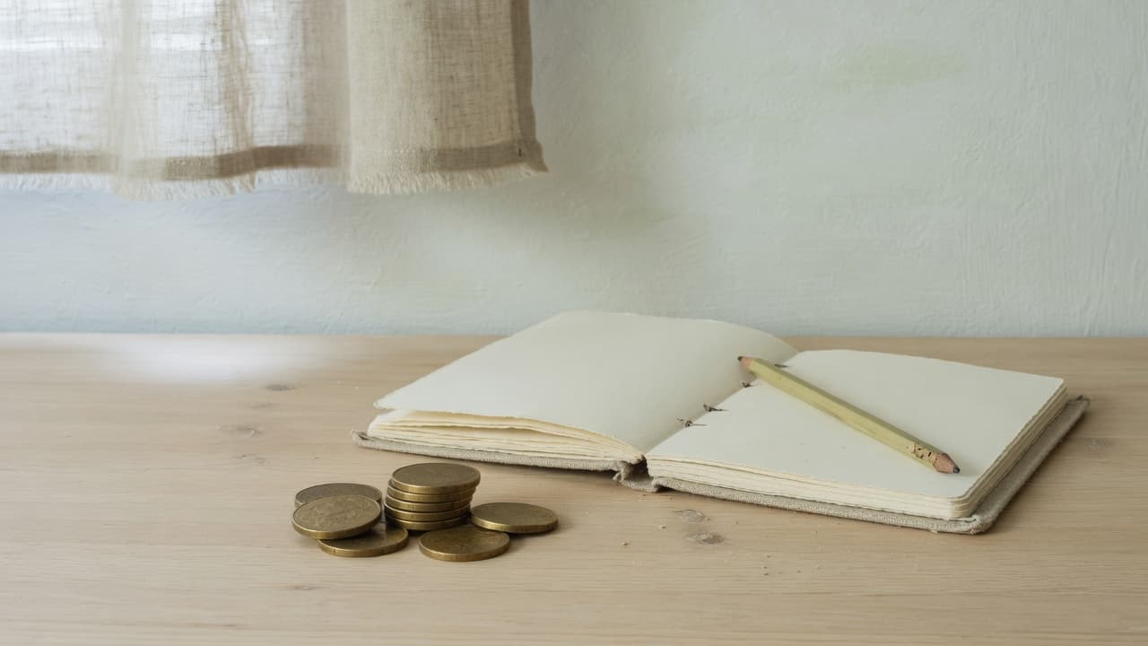 Coins and a notebook